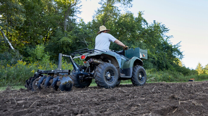 Big or Small: ATV vs. Tractor